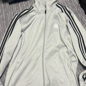 Silver adidas track suit top